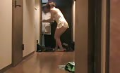 Cleaning her poop