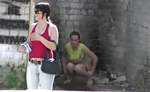 Two girls peeing in public