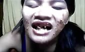 Beautiful Thai pours liquid shit on her own face