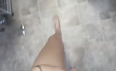 Shaved girl peeing on the floor