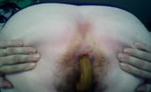 Tattooed girl shitting in a card box