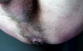 Shaved dark haired girl pooping on floor