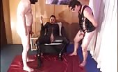 Two hot babes shitting on male slave