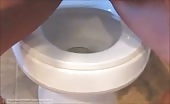 Shaved teen pooping and peeing over toilet