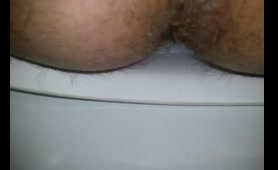 Hairy Babe Squats Over Toilet and Shits While Squirting