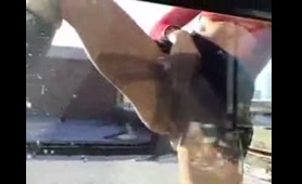 Redhead Pisses Outside on Rooftop While Sitting