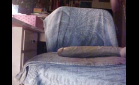 Busty Lady Inserts Bread into Her Ass and Pisses