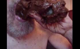 Bearded Man Eats a Nasty Poop in Close-Up