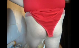 Redhead Pisses in Red Panties and Squirts in Bathroom