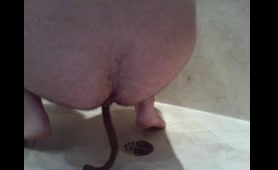 Two Nude Women Squat and Shit and Piss on the Floor