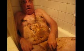 Old man shits in bathtub while jerking off