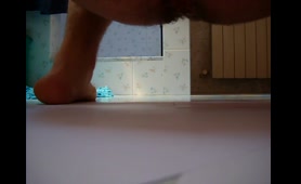 Nude Guy Squats and Shits a Thick Pile on Bathroom Floor