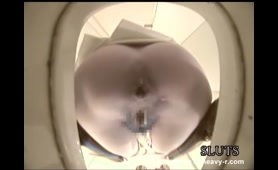 Nude Woman Pisses Over Toilet Seat and Poops in Close-Up