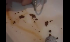 Tattooed Woman Squirts Shit into Bathtub After Enema