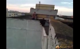Busty Lady Pisses on Rooftop Edge