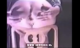 Nude Woman Squeezes Ass Cheeks to Release Shit in Chair