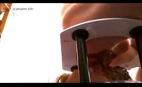 Blonde Woman Squats and Shits into a Metal Tube Outside