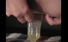 Woman Plays with Shit Filled Condom