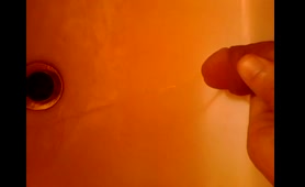Woman Pisses in the Sink