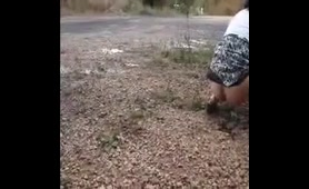 Curvy Babe Pees on the Side of the Road