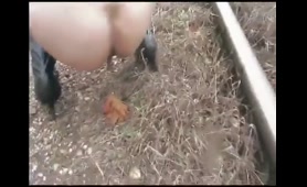 Woman Poops on Railway
