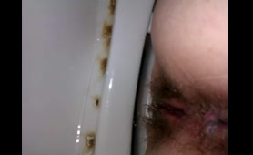 Wife Poops on Toilet Close Up