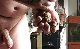 Tattooed Babe Craps in a Cluttered Room