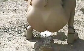 Babe in Leopard Takes a Naughty Dump