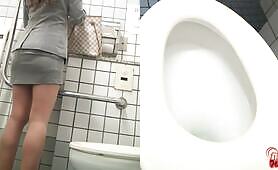 Woman Dumps a Load on the Toilet